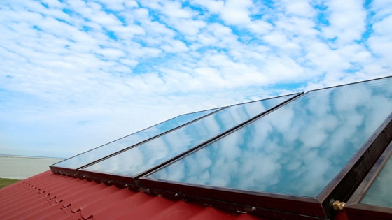solar-panels-clouds-red-roof_1x